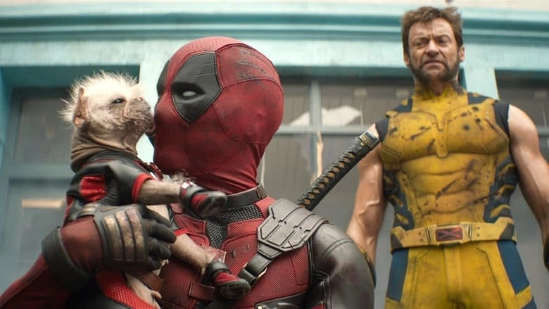 Deadpool cuddling Dogpool while Wolverine looks disgusted, illustrating Ryan Reynolds’ clever use of humor and creativity in marketing the Deadpool franchise.